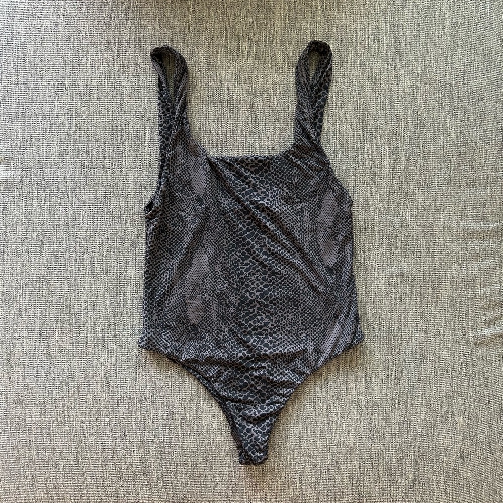 Acacia River one piece in black snake lining